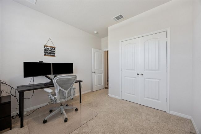 Carpeted office space featuring baseboards | Image 6