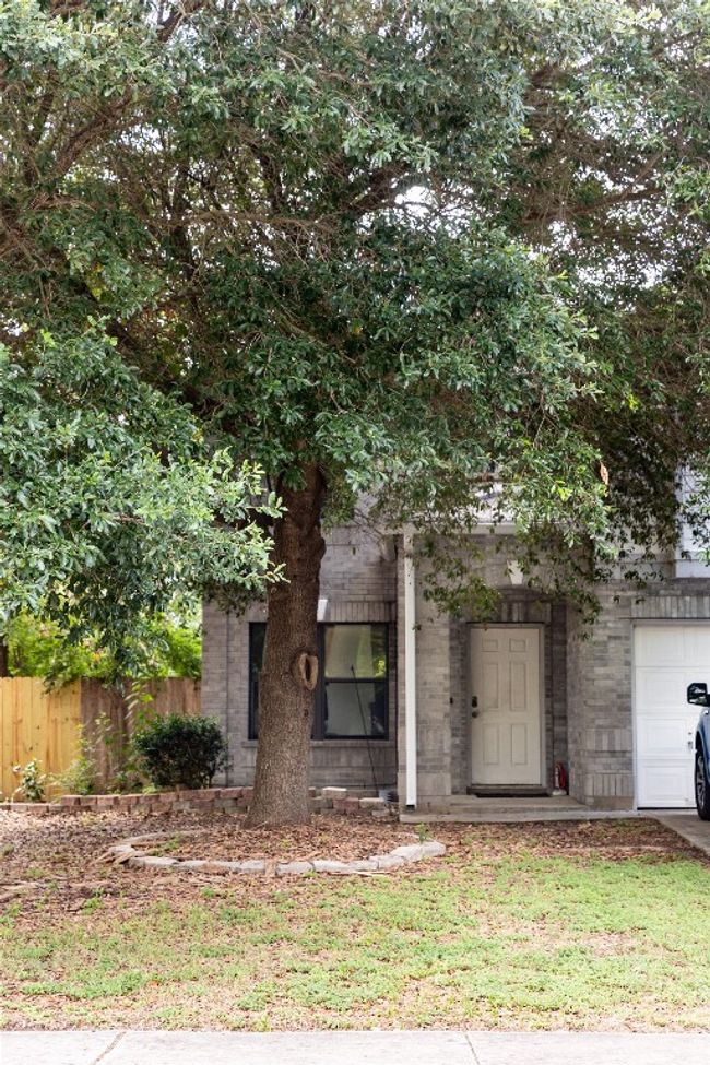 View of front of property with an attached garage and brick siding | Image 30
