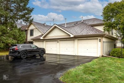 Front Facade. One car garage and driveway parking. | Image 1