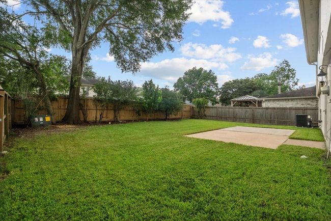 Good size back yard with extended patio | Image 34