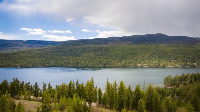 Deck with lake & mountain views | Image 27