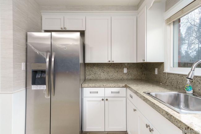 kitchen with new stainless steel appliances | Image 12