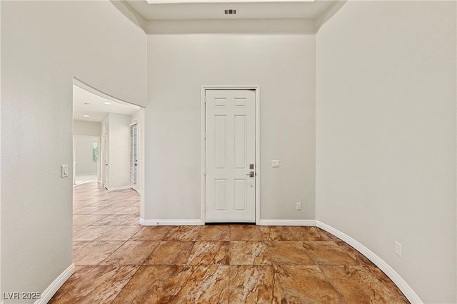 Empty room featuring baseboards | Image 12