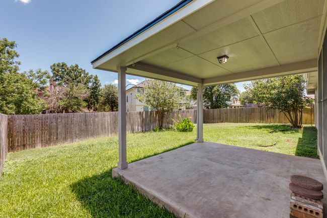 Fenced backyard featuring a patio | Image 35