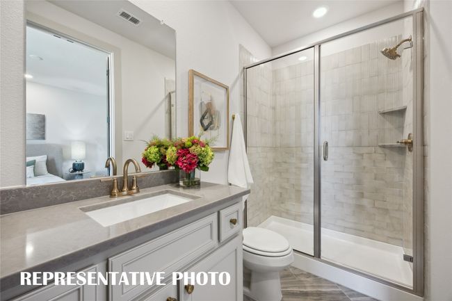 Your guests will never want to leave the beautiful and spacious guest baths in our Sophie plan! REPRESENTATIVE PHOTO | Image 17