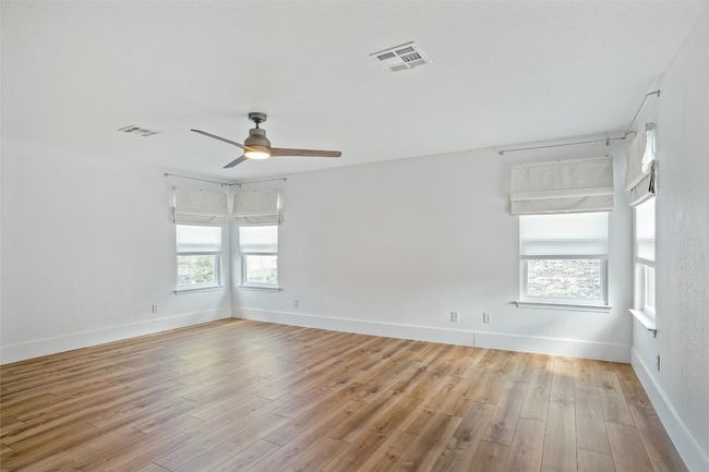 Primary suite large enough for king size bed and seating area | Image 18