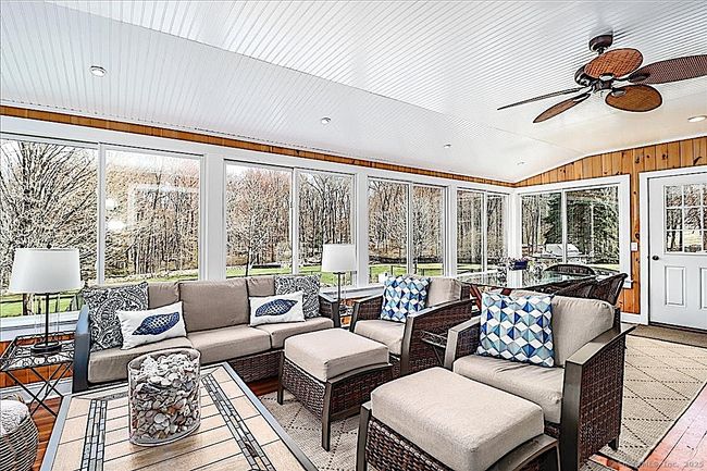 Four Season Room Overlooks Peaceful Lot | Image 9