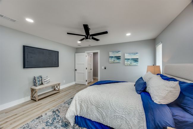 Bedroom with wood finished floors, recessed lighting, and ceiling fan | Image 19