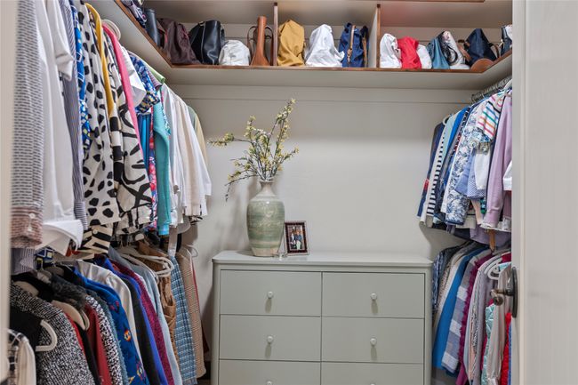 His and hers walk-in closets. | Image 38