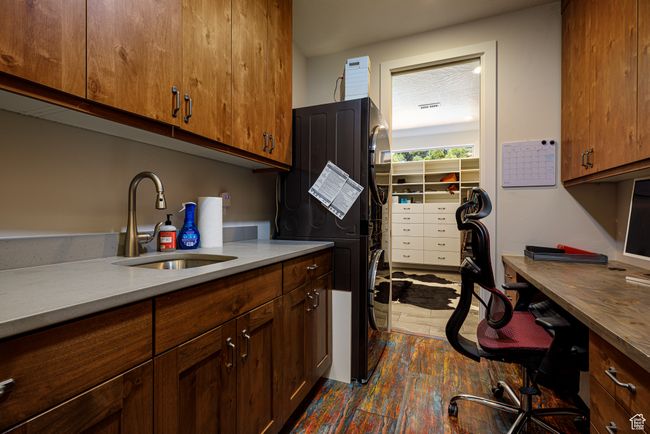 Laundry / Office, light countertops, a sink, and Washer and Dryer. Complete office set-up with fiber internet | Image 25