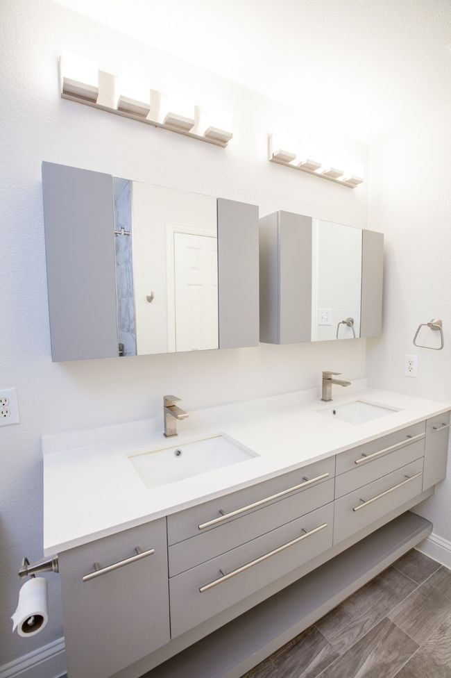 Bathroom featuring double vanity and baseboards | Image 28