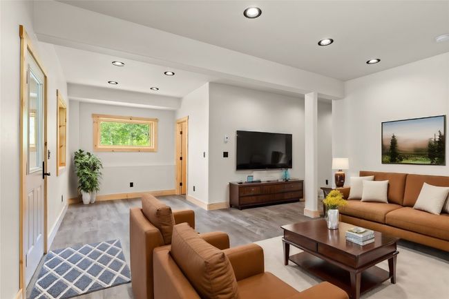 Virtual staged downstairs as Living space | Image 38