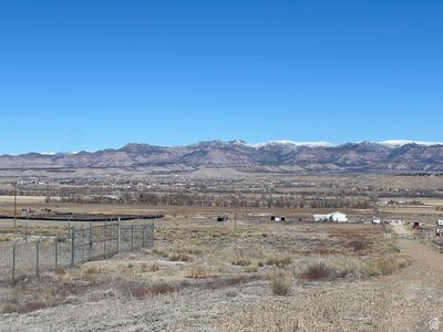 Property is behind the fenced in acreage. | Image 1