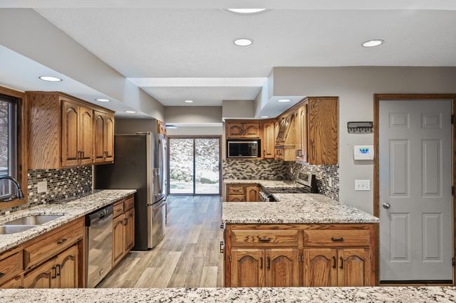 The skylight, window view to the backyard and recessed lighting add a nice amount of light into the space - | Image 17