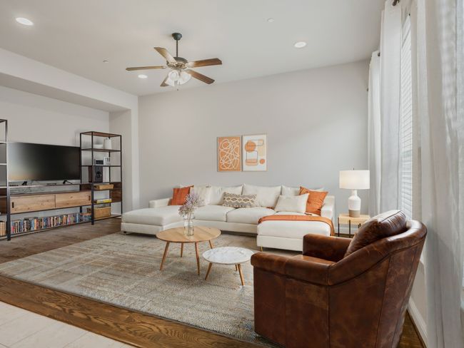 Living area featuring a ceiling fan, recessed lighting, and wood finished floors | Image 12