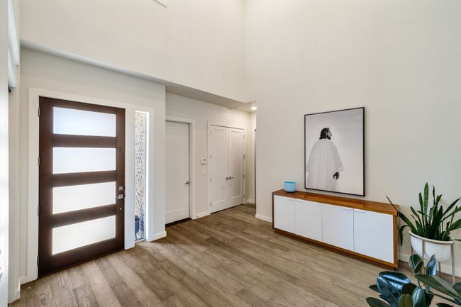 Entryway with light wood-type flooring and baseboards | Image 5