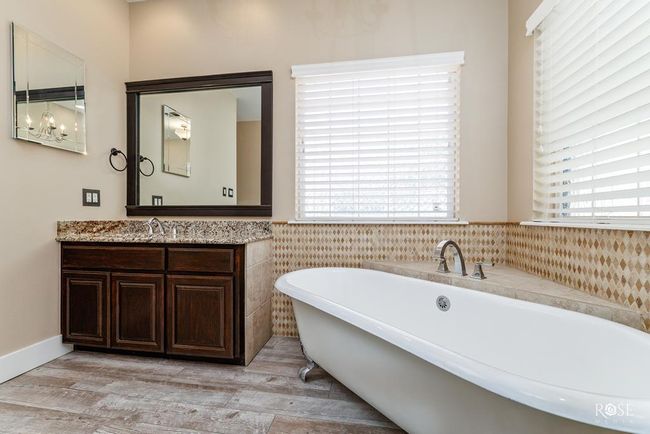 primary bath with beautiful tile work | Image 18
