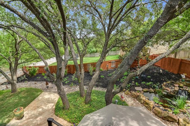 Fenced backyard featuring a patio | Image 26
