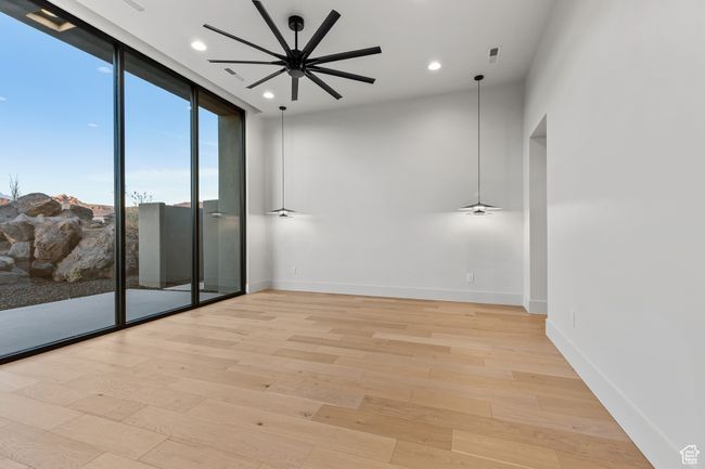 Unfurnished room with recessed lighting, light wood finished floors, visible vents, a ceiling fan, and baseboards | Image 34