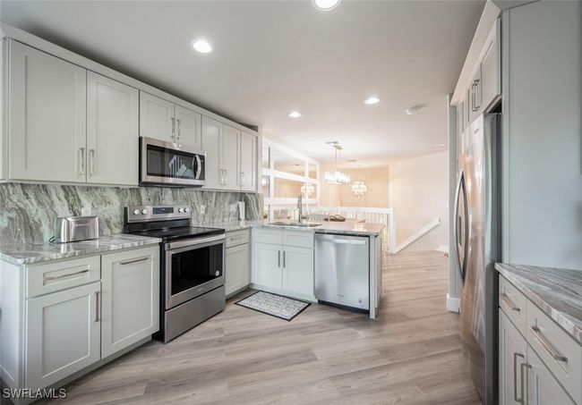 27113 Oakwood Lake Dr, House attached with 3 bedrooms, 3 bathrooms and null parking in BONITA SPRINGS FL | Image 11