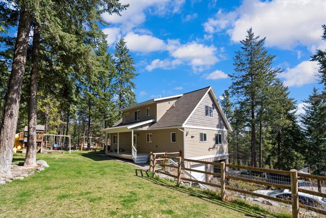 View of property exterior with fence | Image 35