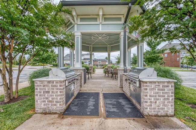 View of patio featuring exterior kitchen and a gazebo | Image 33