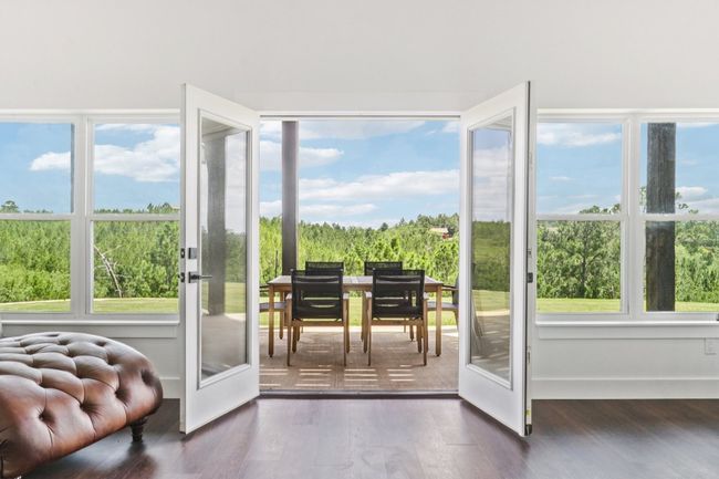 Entryway featuring dark wood-style floors and plenty of natural light | Image 21