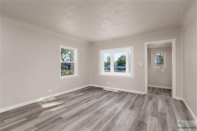 Living room with new LVP flooring | Image 2