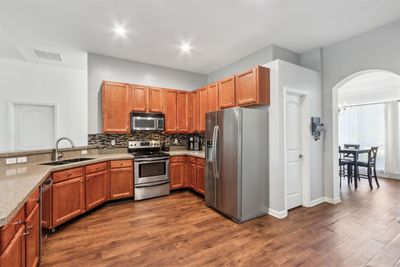 Kitchen with Bar Seating | Image 3