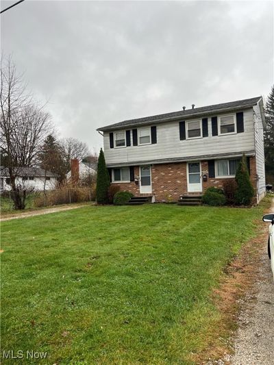 View of front facade featuring a front yard | Image 1