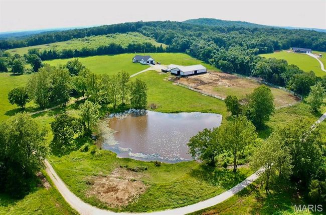 Overview of rural landscape featuring a large body of water | Image 10