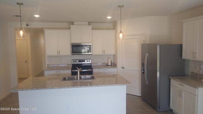 7144 Topaz Dr, House other with 4 bedrooms, 2 bathrooms and null parking in Grant Valkaria FL | Image 13