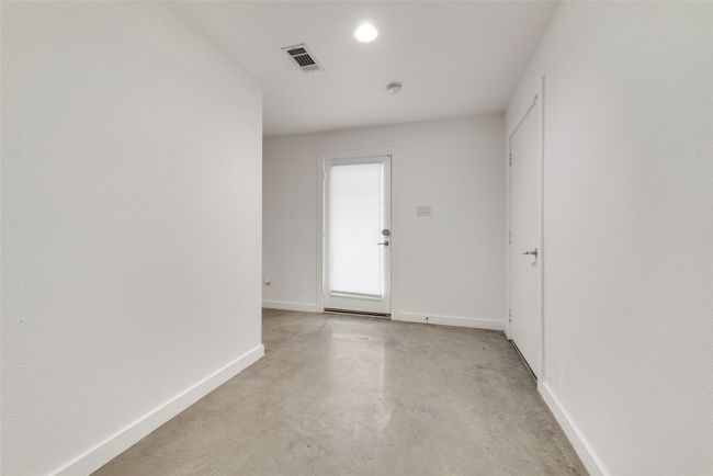 Spare room featuring concrete floors, baseboards, and recessed lighting | Image 17