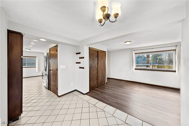 Family room without furniture | Image 16