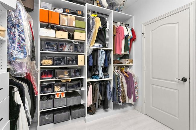Primary walk-in closet. | Image 28