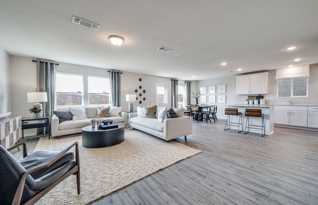 Open concept gathering room creating a spacious and inviting atmosphere *Model representation | Image 7