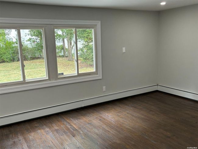 56 Sagebrush Ln, House other with 4 bedrooms, 3 bathrooms and null parking in Islandia NY | Image 9