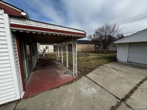 15721 Harrison, Romulus, MI, 48174-3096 | Card Image