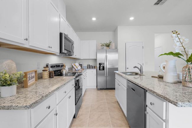 1037 Lido Dr, Townhouse with 3 bedrooms, 3 bathrooms and null parking in HOWEY IN THE HILLS FL | Image 6