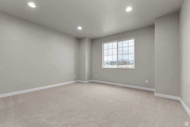Spare room with recessed lighting, light carpet, and baseboards | Image 14
