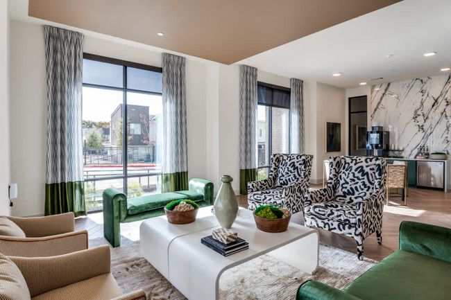 Living room featuring a wealth of natural light and light hardwood / wood-style floors | Image 24
