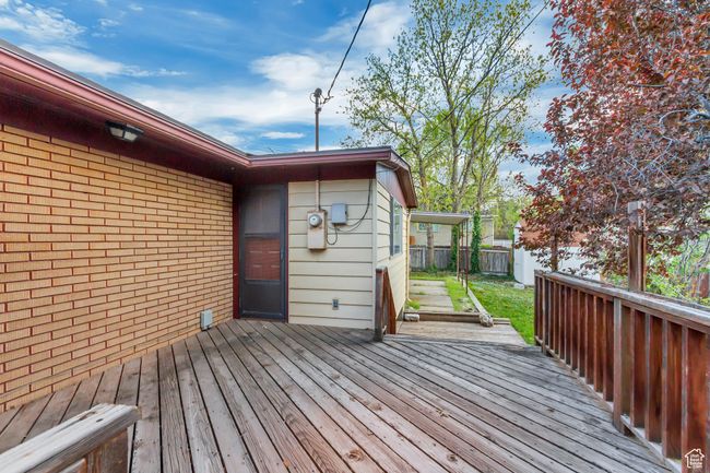 Wooden deck featuring fence | Image 30