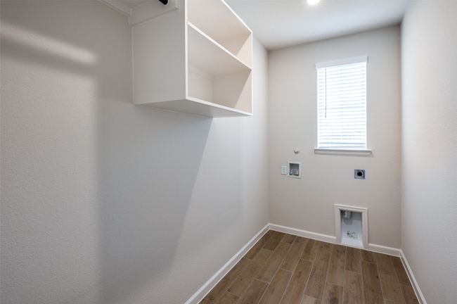 Laundry area with hardwood / wood-style floors, hookup for a washing machine, gas dryer hookup, and electric dryer hookup | Image 19