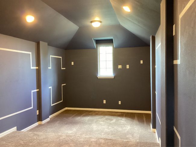 Bonus room with carpet flooring, lofted ceiling, and baseboards | Image 26