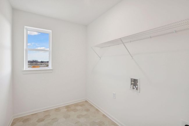upstairs laundry w a window | Image 23