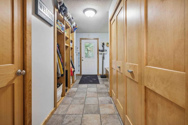 Maple built in storage entrance | Image 11