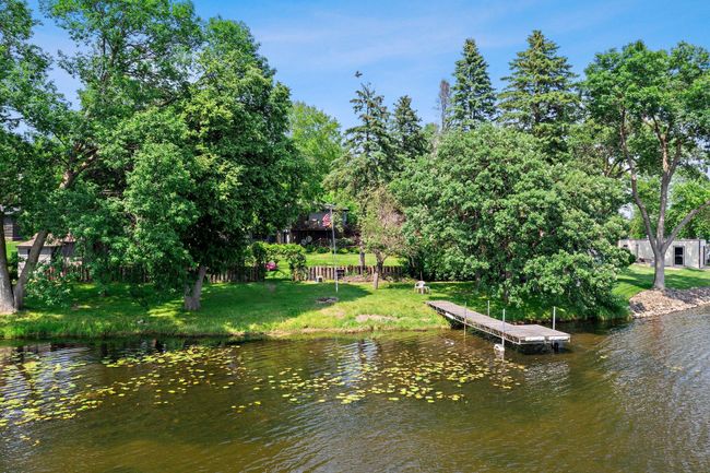 An in-ground irrigation system draws from the lake to maintain the lush landscape, which even includes established asparagus and horseradish plants. | Image 16