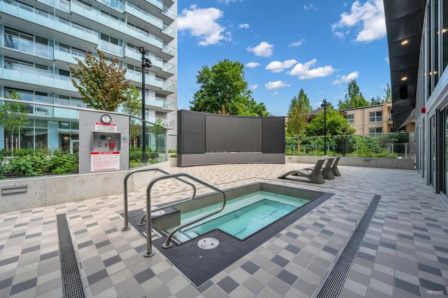 View of pool with a community hot tub | Image 40