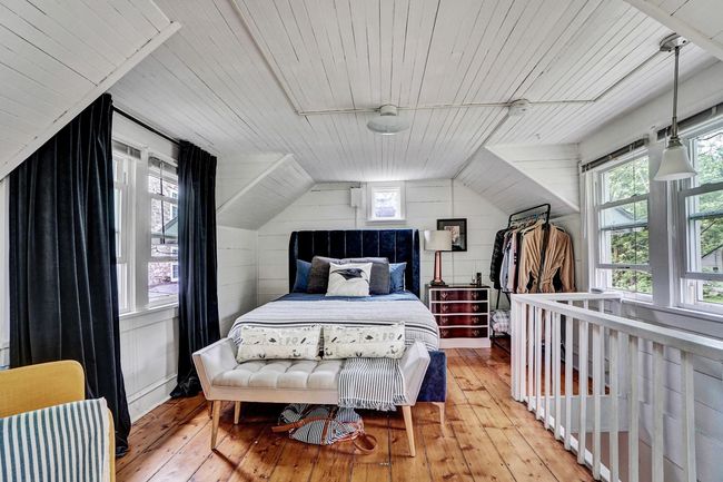 Bedroom featuring vaulted ceiling, light wood-type flooring, and wooden ceiling | Image 10