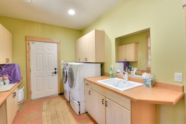 Main Home Laundry and Garage Access Main Floor | Image 40